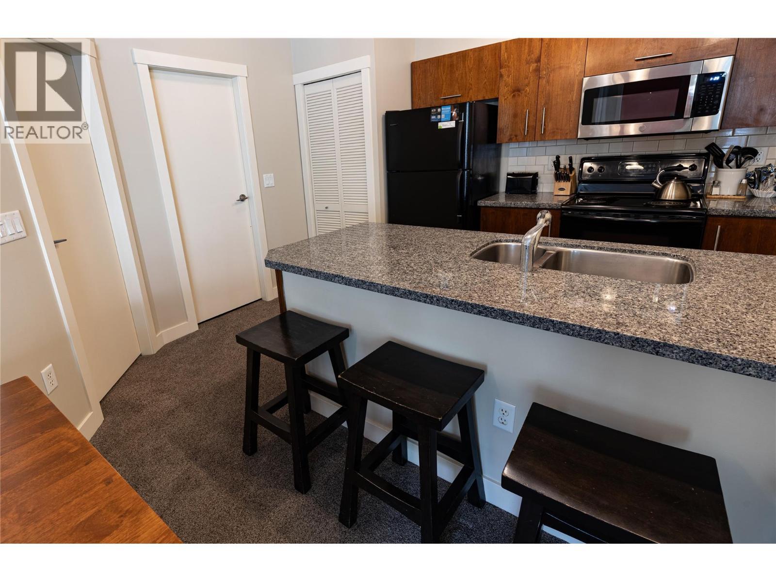 2049 Summit Drive Unit# 212A, Panorama, BC - Indoor Photo Showing Kitchen With Double Sink