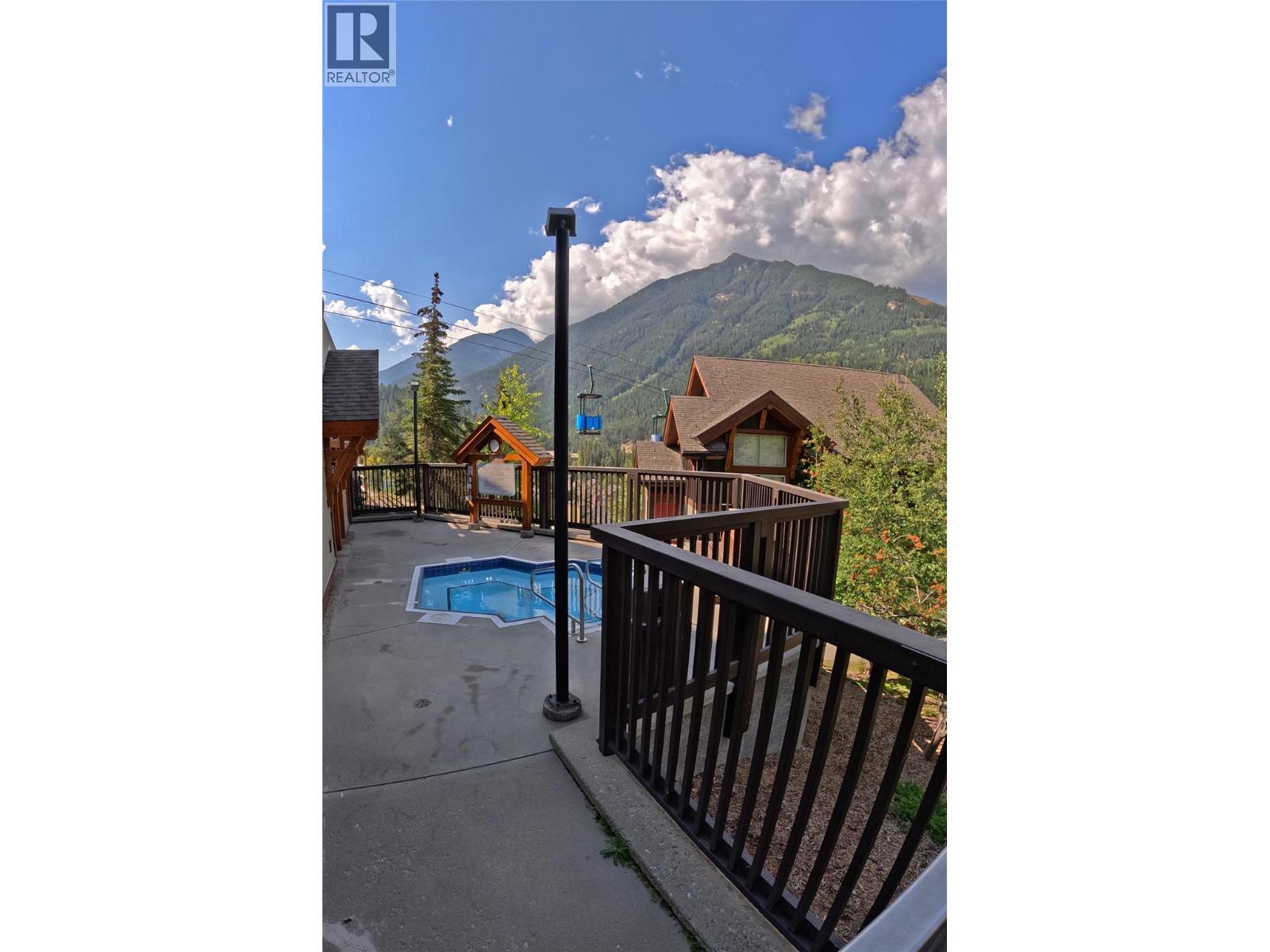 2049 Summit Drive Unit# 212A, Panorama, BC - Outdoor With In Ground Pool