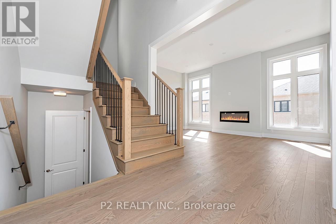 8 Wild Ginger Lane, Springwater, ON - Indoor Photo Showing Other Room With Fireplace