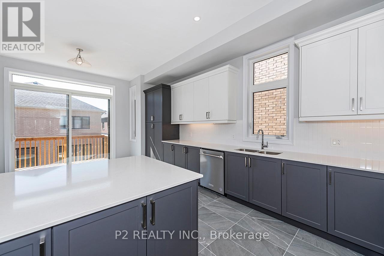 8 Wild Ginger Lane, Springwater, ON - Indoor Photo Showing Kitchen With Double Sink