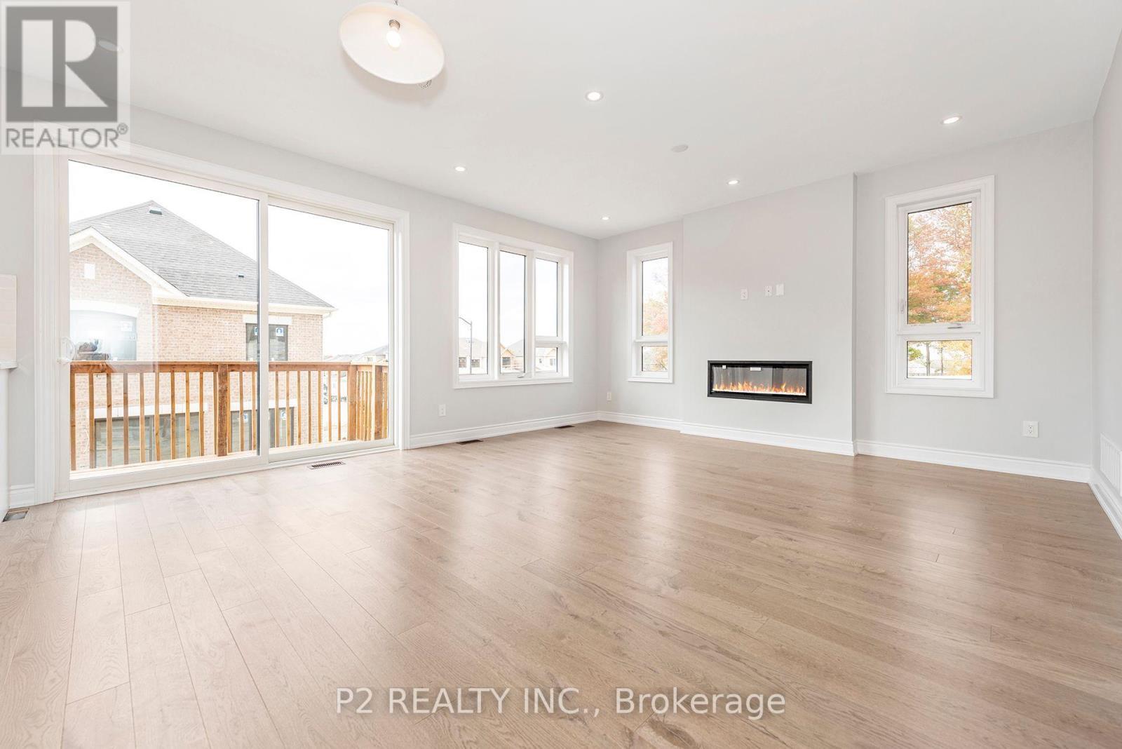 2 Wild Ginger Lane, Springwater, ON - Indoor With Fireplace