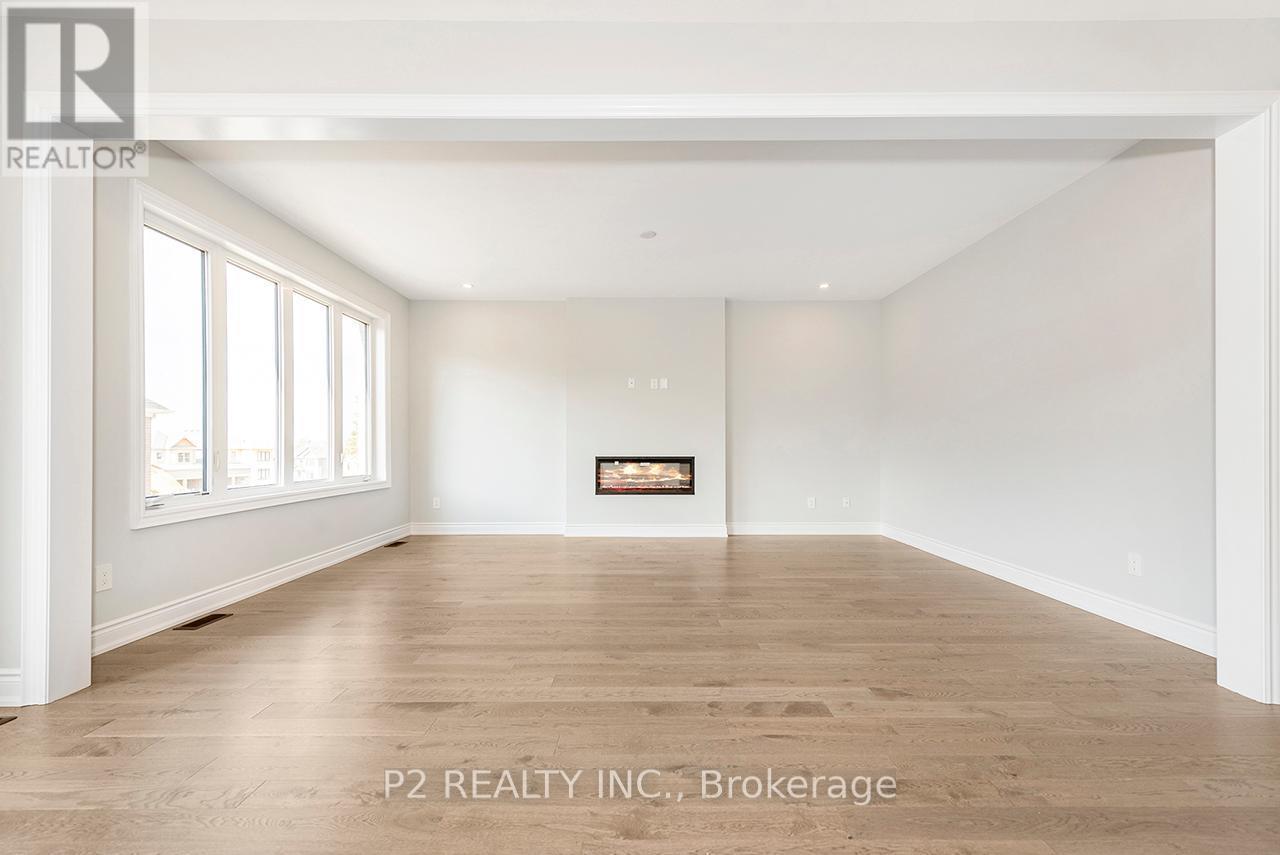 4 Wild Ginger Lane, Springwater, ON - Indoor Photo Showing Other Room With Fireplace