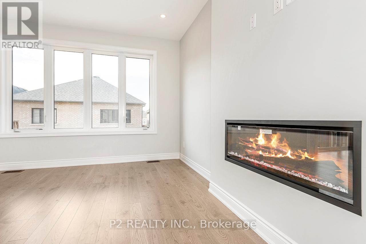 4 Wild Ginger Lane, Springwater, ON - Indoor With Fireplace