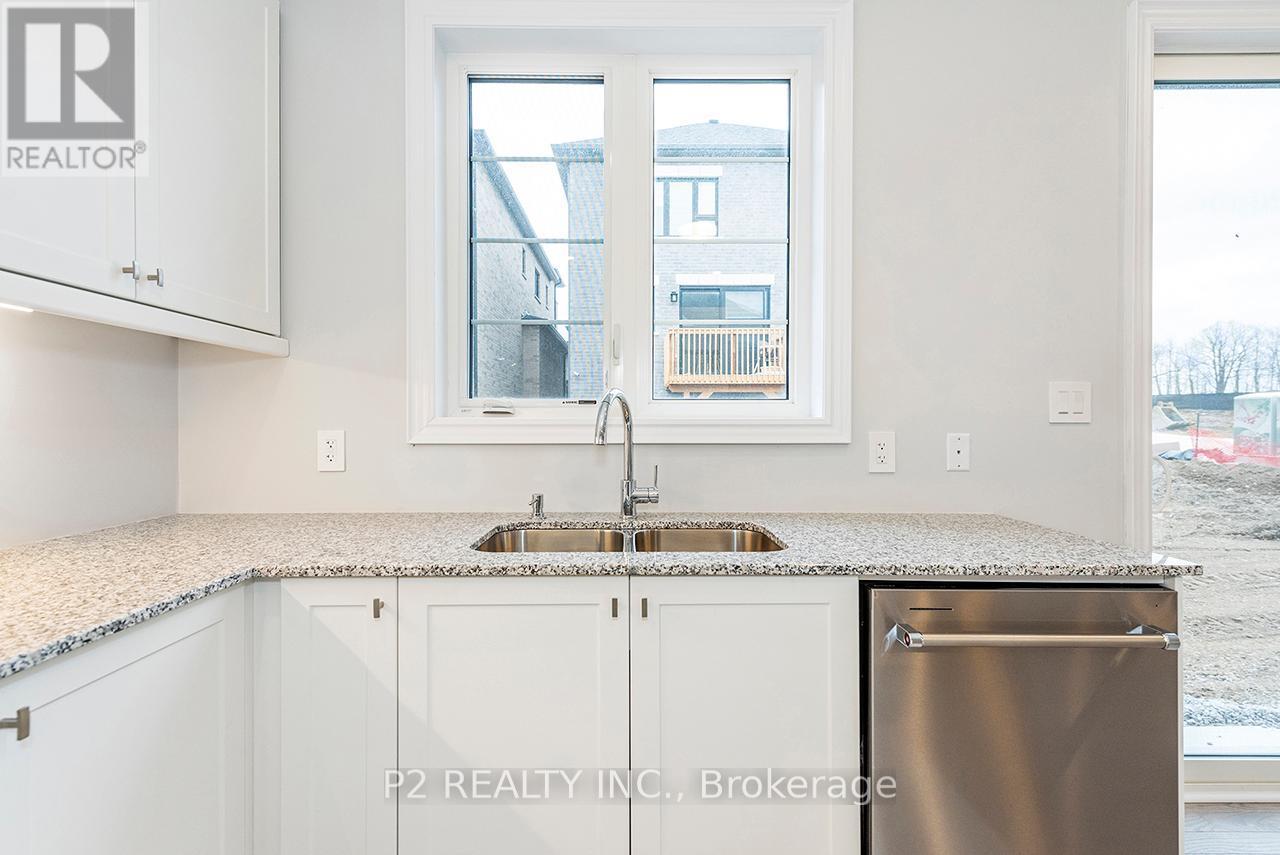 49 Periwinkle Road, Springwater, ON - Indoor Photo Showing Kitchen With Double Sink