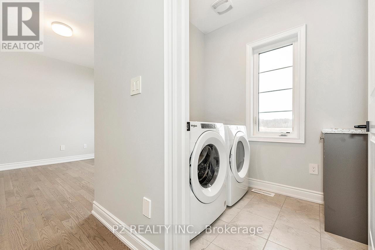 49 Periwinkle Road, Springwater, ON - Indoor Photo Showing Laundry Room