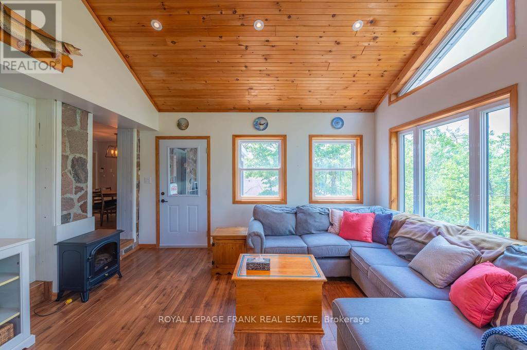 48 Fire Route 81, Trent Lakes, ON - Indoor Photo Showing Living Room With Fireplace