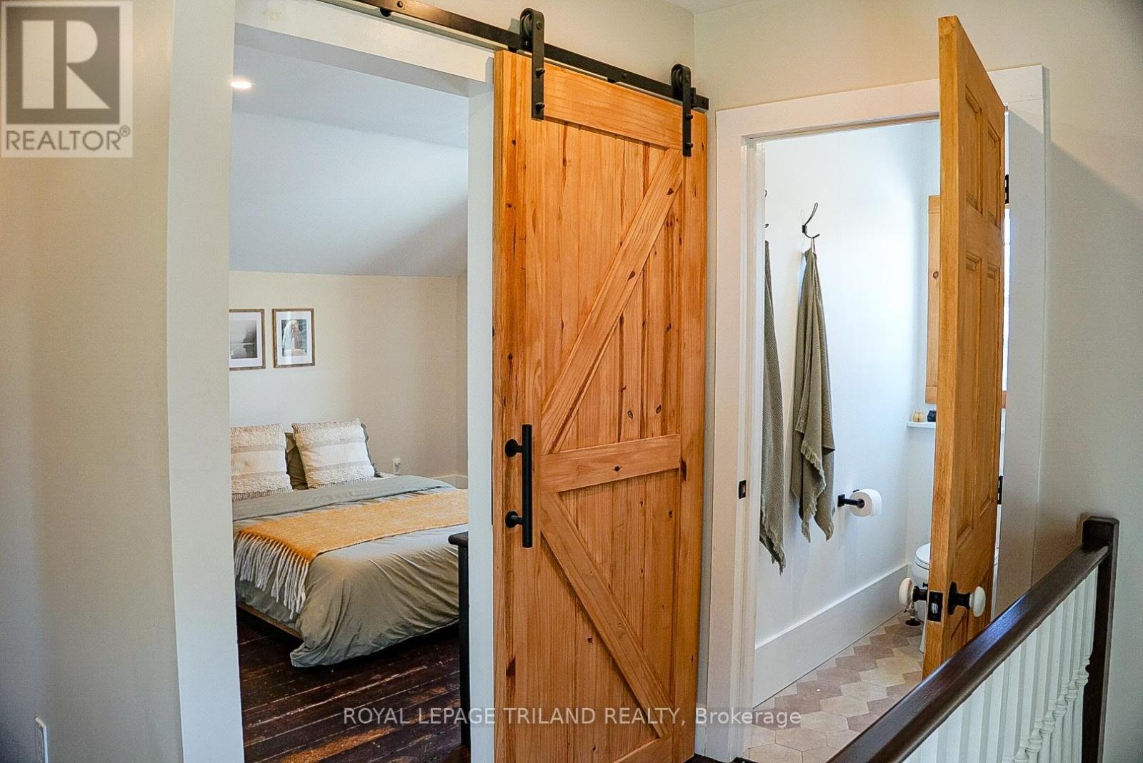 2nd storey: Primary bedroom & door to 3PC bathroom - 71 Huron Street, Huron-Kinloss, ON - Indoor Photo Showing Other Room