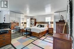 Primary Bedroom with Trap Door to Basement -