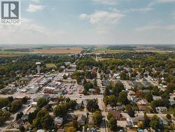 Aerial view of residential area with a tree filled landscape -