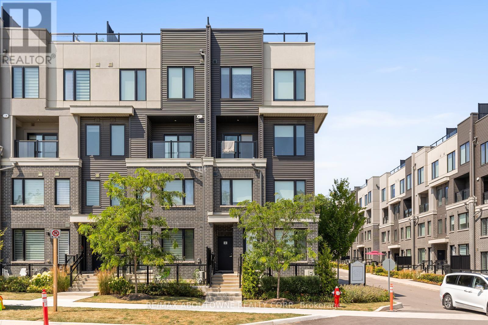 2 - 3472 Widdicombe Way, Mississauga, ON - Outdoor With Balcony With Facade