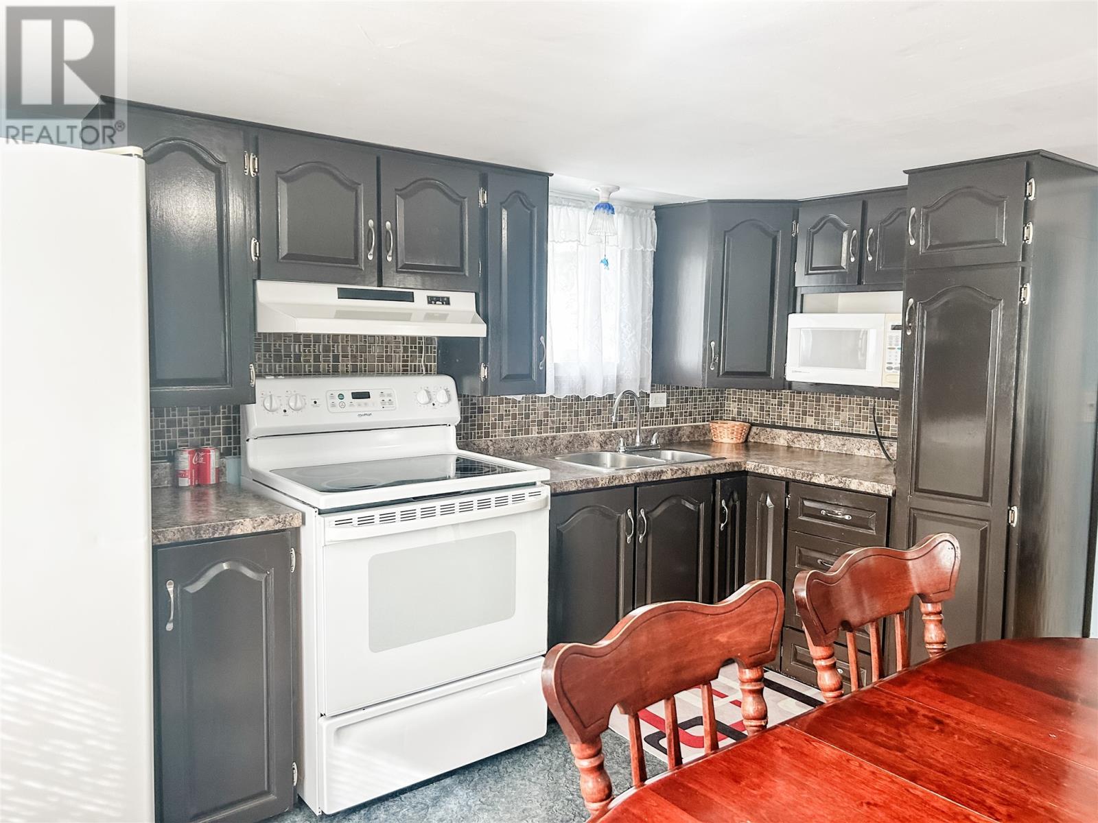 2 Collins Lane, Marystown, NL - Indoor Photo Showing Kitchen With Double Sink