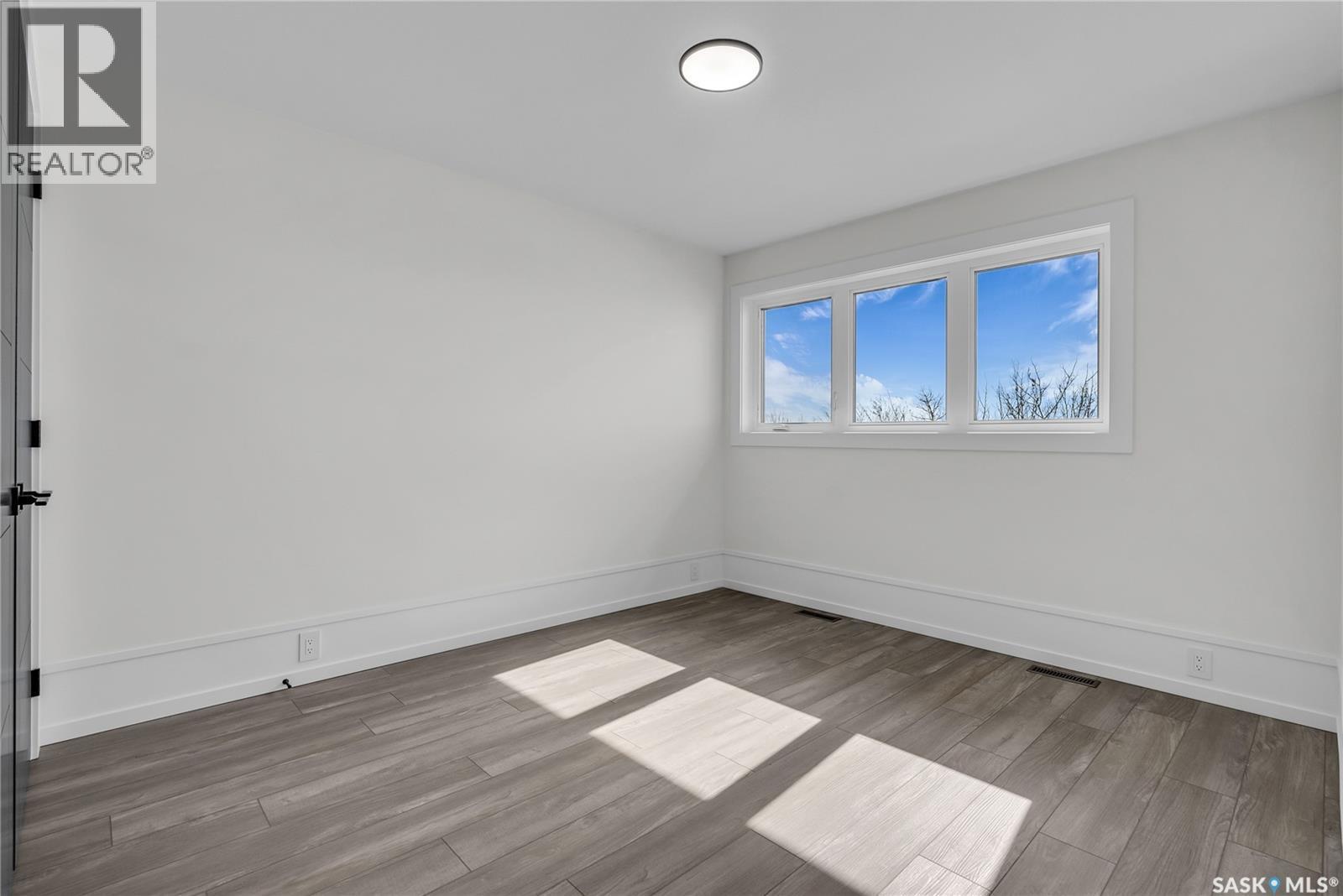 428 Woolf Bend, Saskatoon, SK - Indoor Photo Showing Other Room