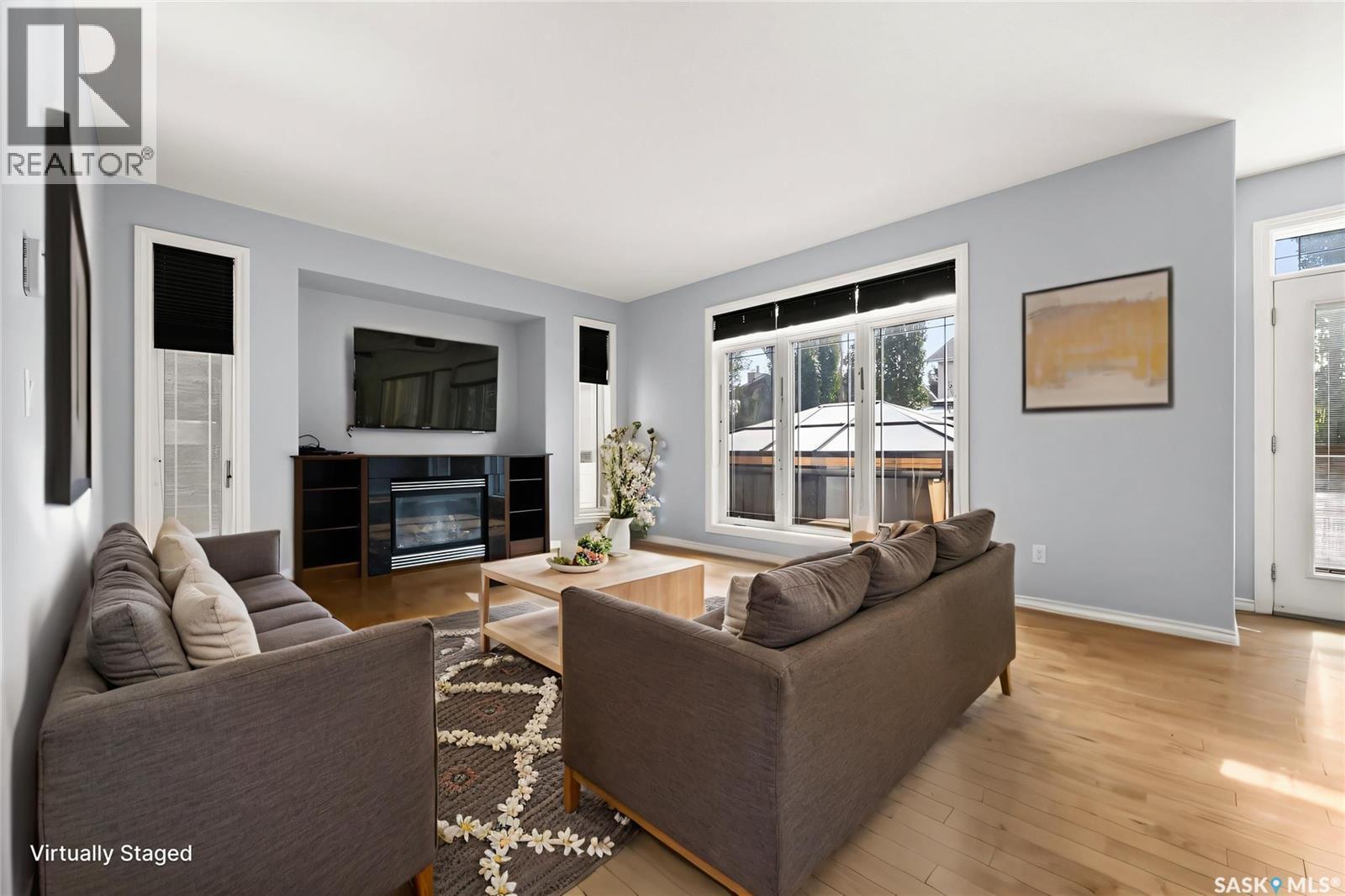 6925 Maple Ridge Drive, Regina, SK - Indoor Photo Showing Living Room With Fireplace