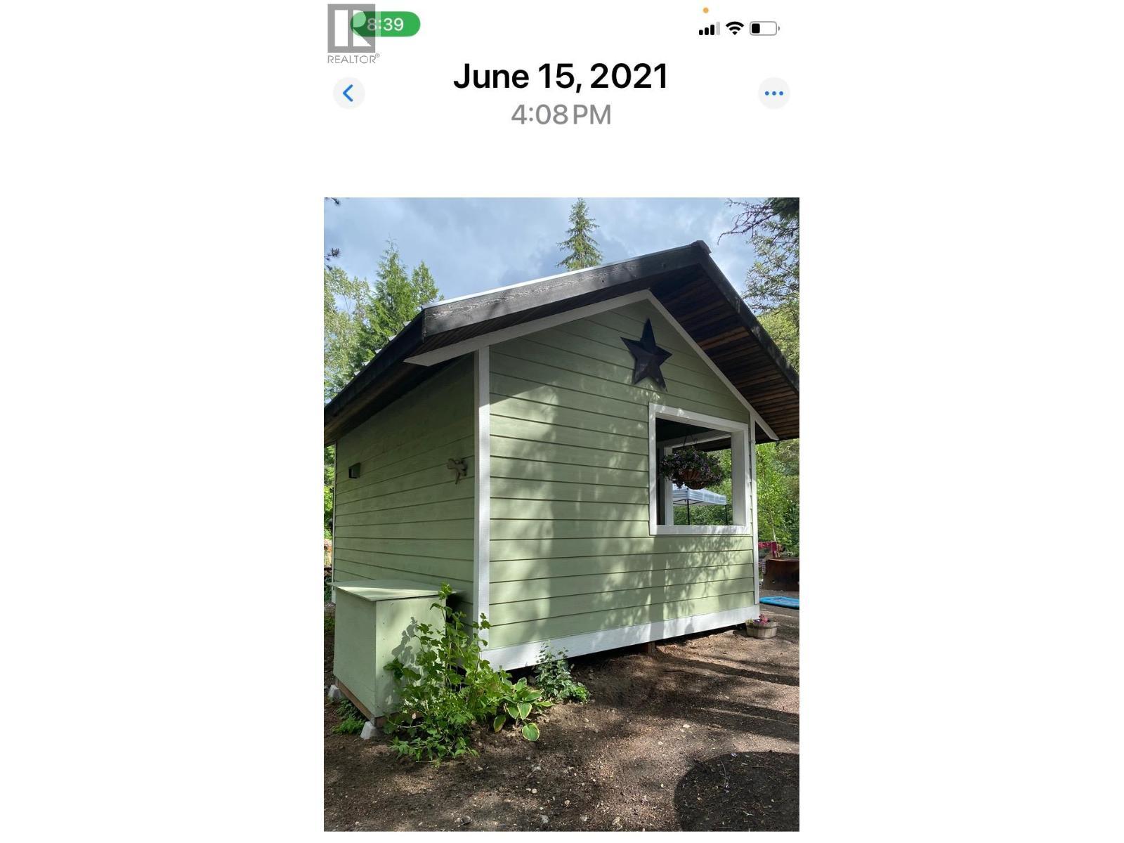 There is a little cabin down by the creek, with a playground, covered eating and food prep area--the kids will love it! - 7839 Falcon Ridge Crescent, Kelowna, BC -