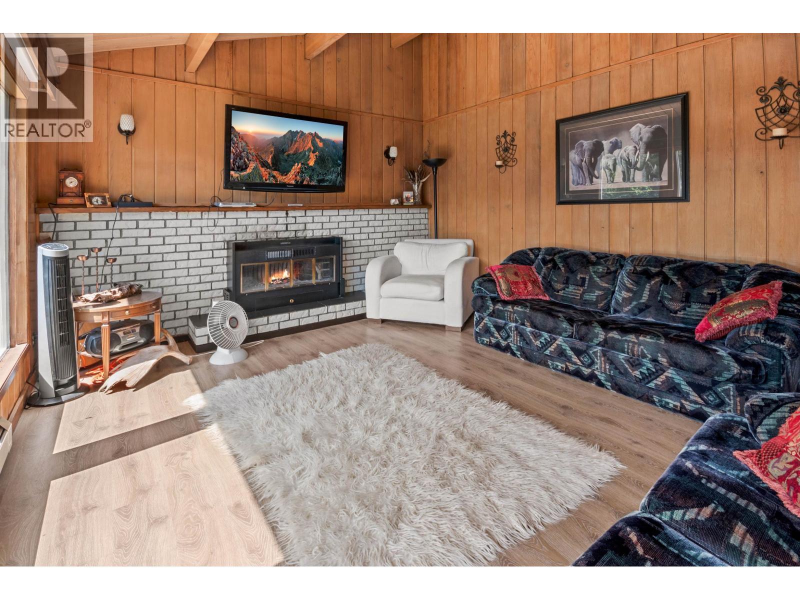 7267 Summit Road, Canim Lake, BC - Indoor Photo Showing Living Room With Fireplace