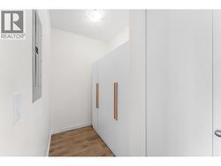 Den space. Storage cupboards can be removed. -