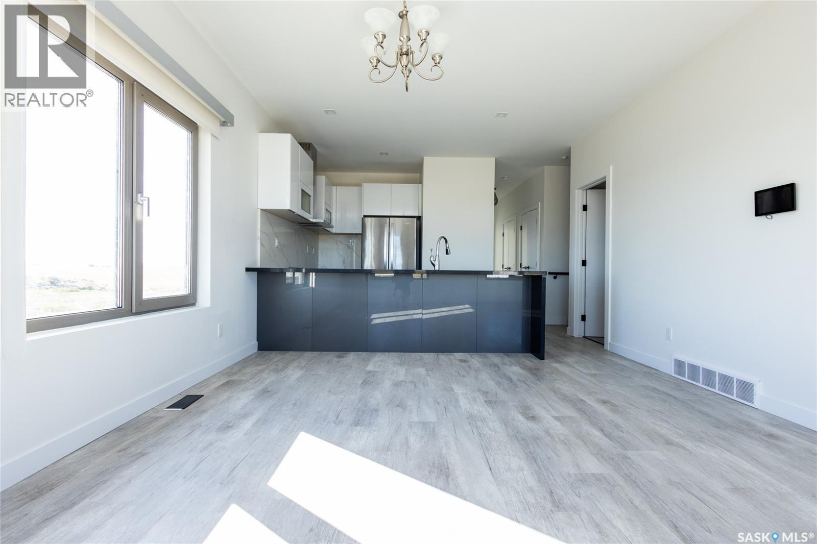 3 298 Prairie Dawn Drive, Dundurn, SK - Indoor Photo Showing Kitchen