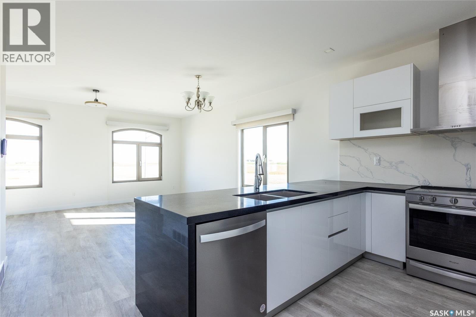 3 298 Prairie Dawn Drive, Dundurn, SK - Indoor Photo Showing Kitchen With Double Sink With Upgraded Kitchen