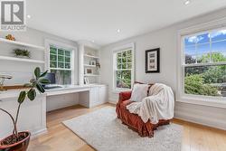 Office with Built-In Desk, Cabinetry and Shelving -