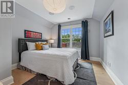 Fourth Bedroom with Hardwood Flooring -