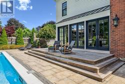 Prof. Landscaped Backyard Oasis with a Custom Deck -