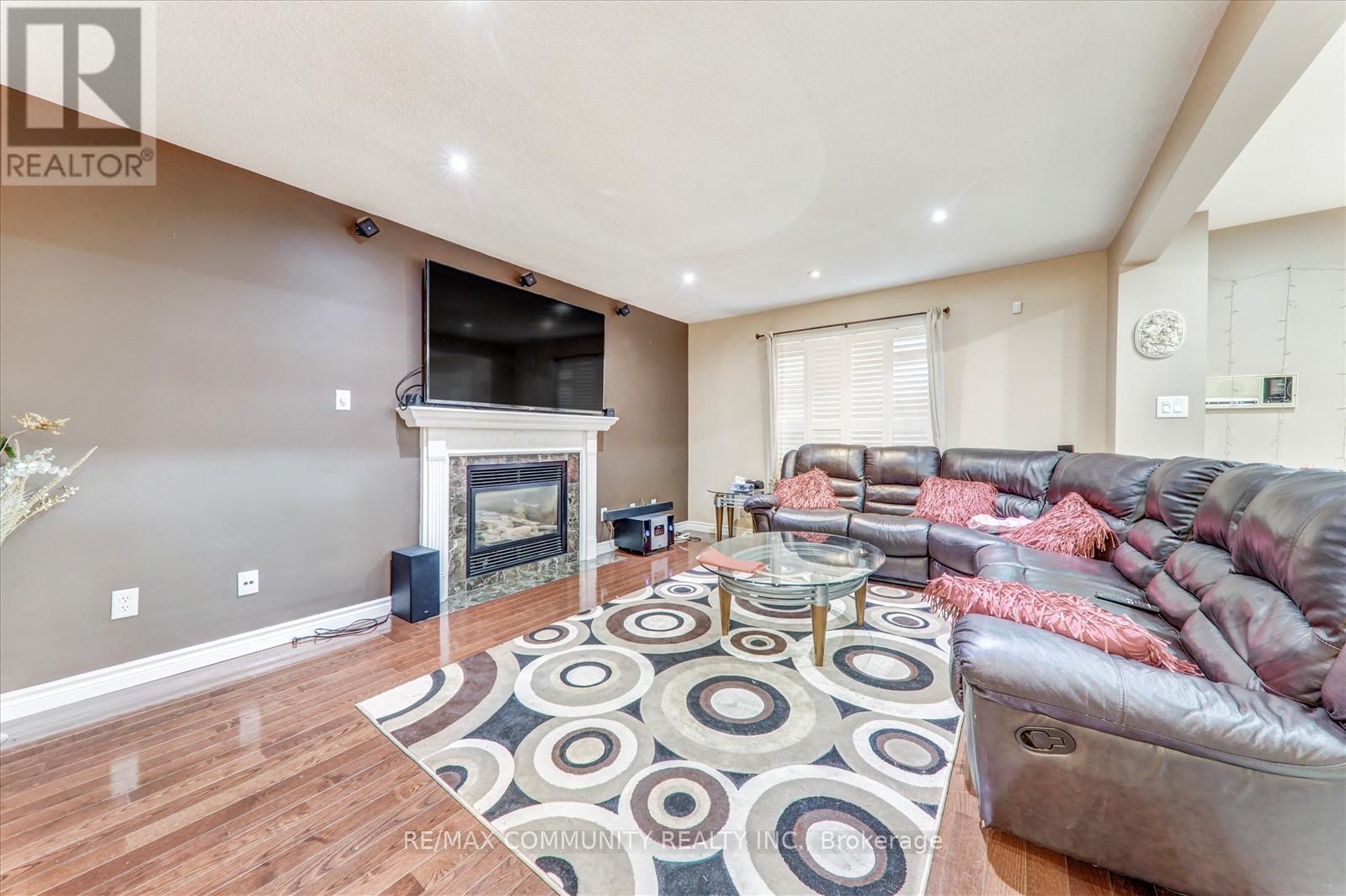 Main - 35 Hartrick Place, Whitby, ON - Indoor Photo Showing Other Room With Fireplace