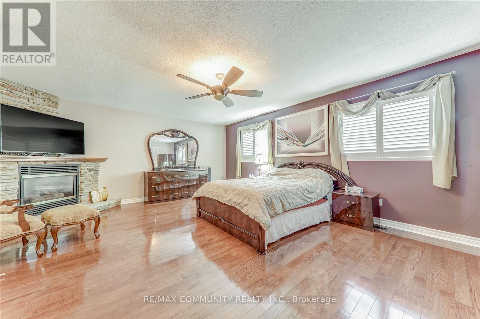 Main - 35 Hartrick Place, Whitby, ON - Indoor Photo Showing Bedroom With Fireplace