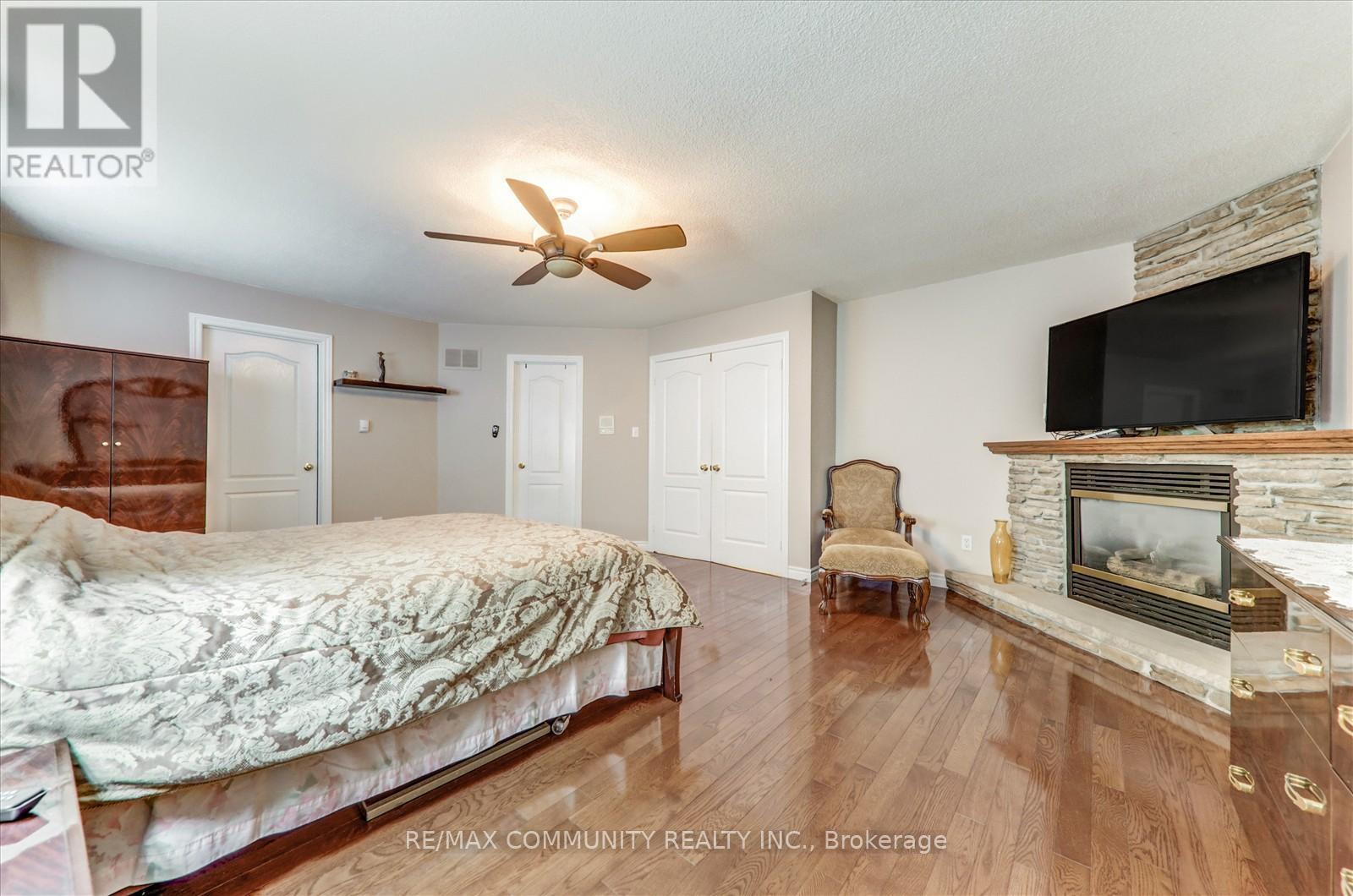 Main - 35 Hartrick Place, Whitby, ON - Indoor Photo Showing Bedroom With Fireplace