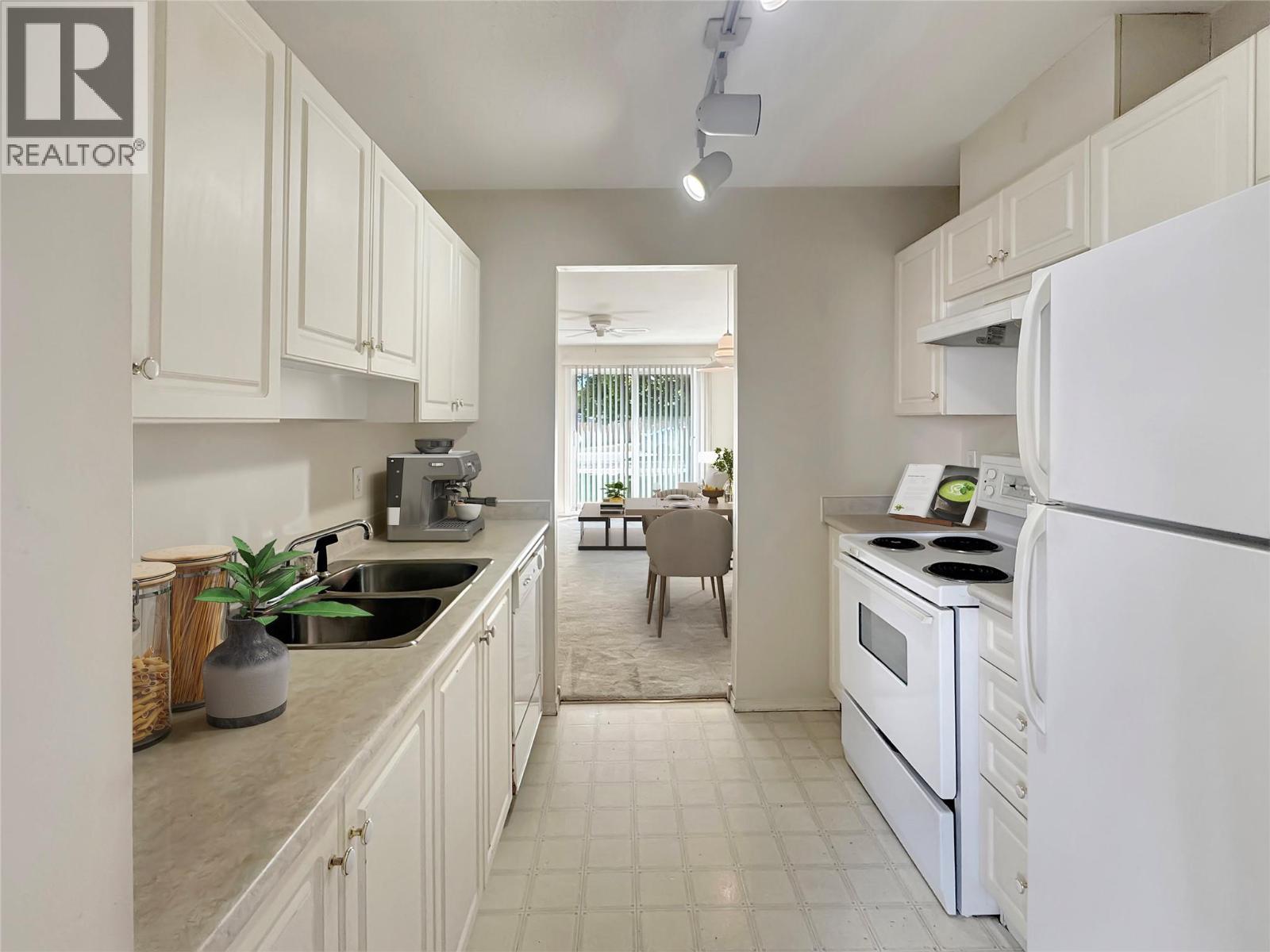 Virtually Staged - 1004 23 Avenue N Unit# 113, Cranbrook, BC - Indoor Photo Showing Kitchen With Double Sink