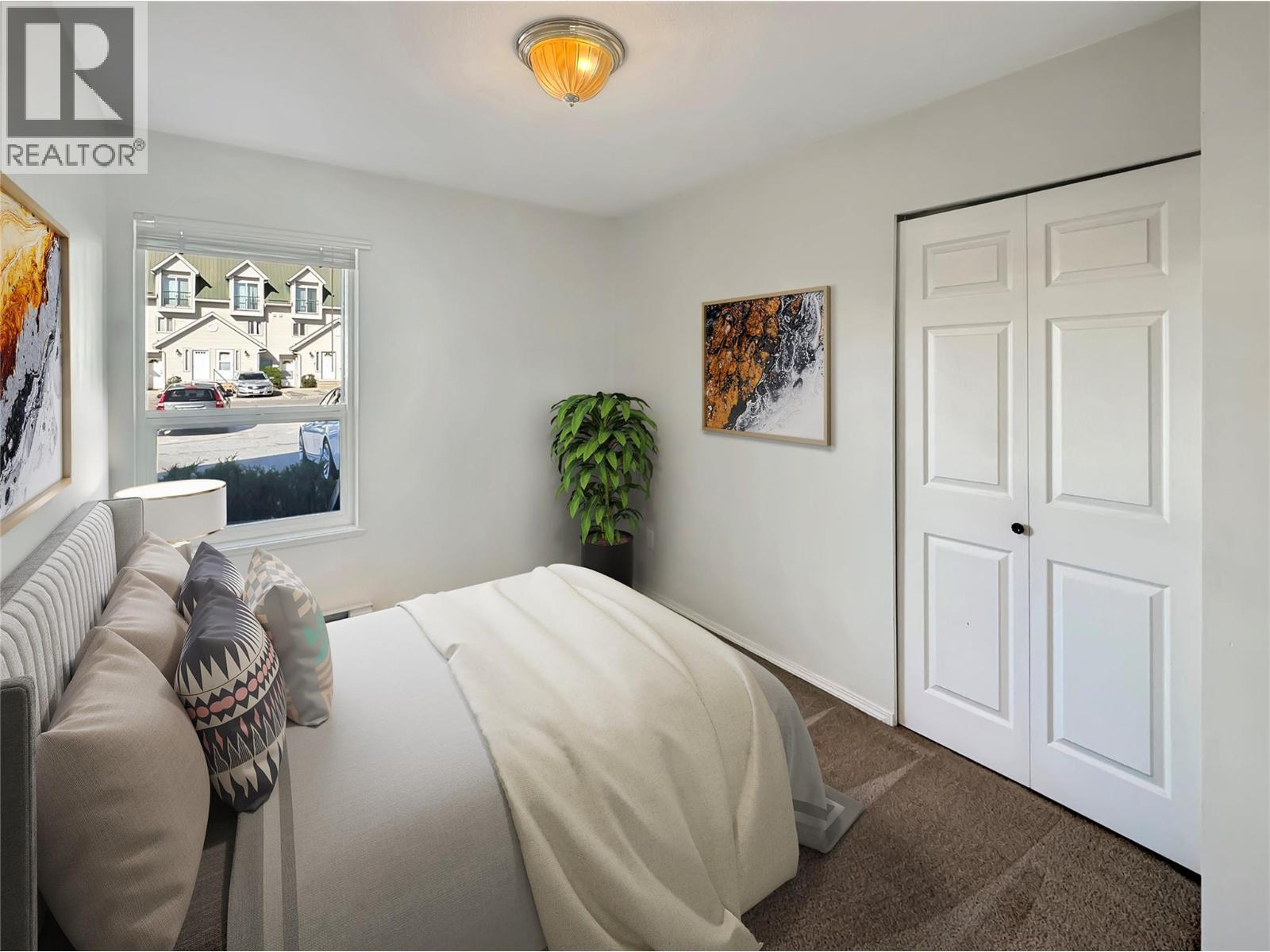 Virtually Staged - 1004 23 Avenue N Unit# 113, Cranbrook, BC - Indoor Photo Showing Bedroom