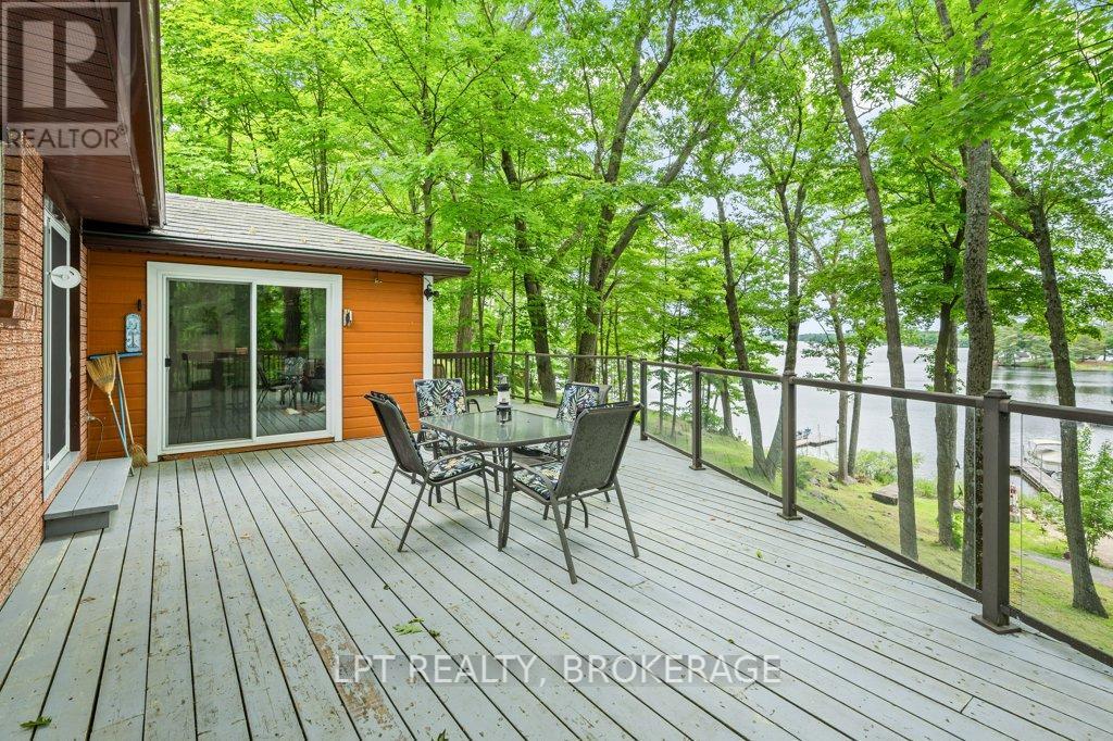 31 Acorn Lane, Frontenac (Frontenac South), ON - Outdoor With Body Of Water With Deck Patio Veranda With Exterior