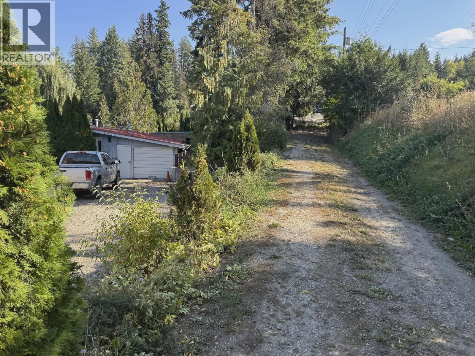 upper and lower driveway parking - 2662 Centennial Drive, Blind Bay, BC