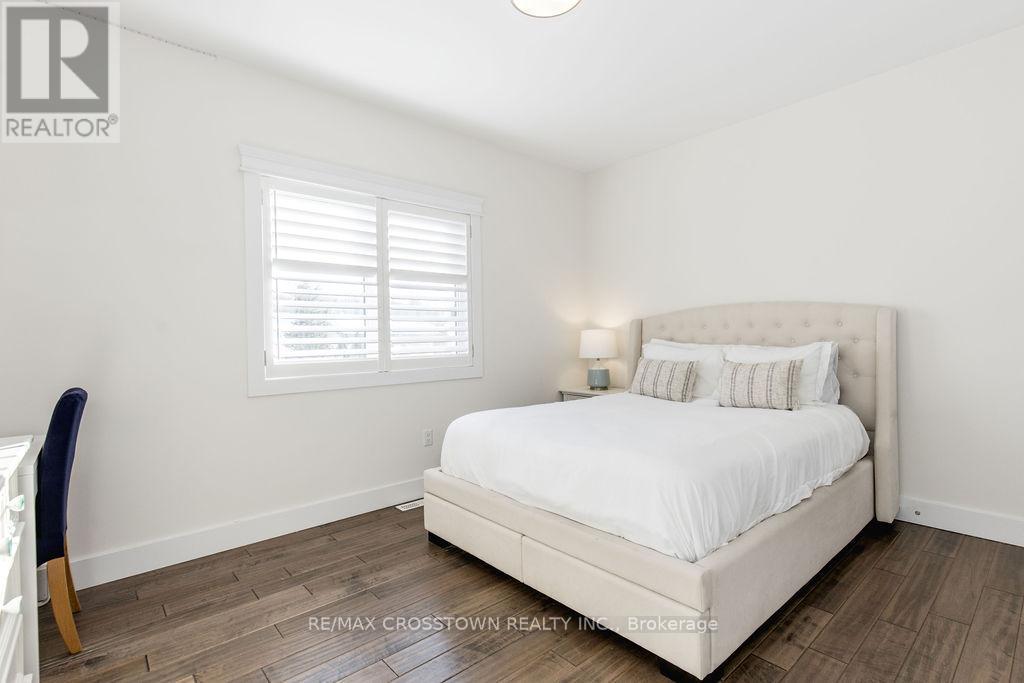 25 Mennill Drive, Springwater, ON - Indoor Photo Showing Bedroom