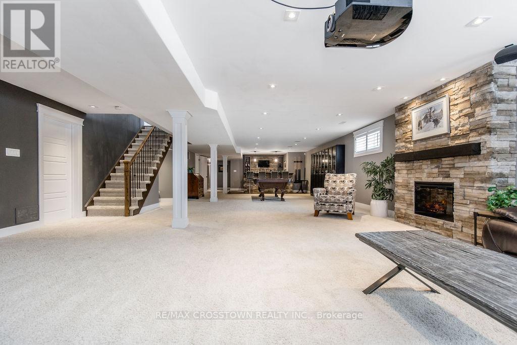 25 Mennill Drive, Springwater, ON - Indoor With Fireplace