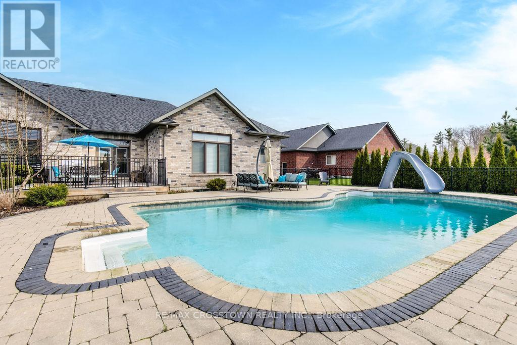 25 Mennill Drive, Springwater, ON - Outdoor With In Ground Pool With Deck Patio Veranda
