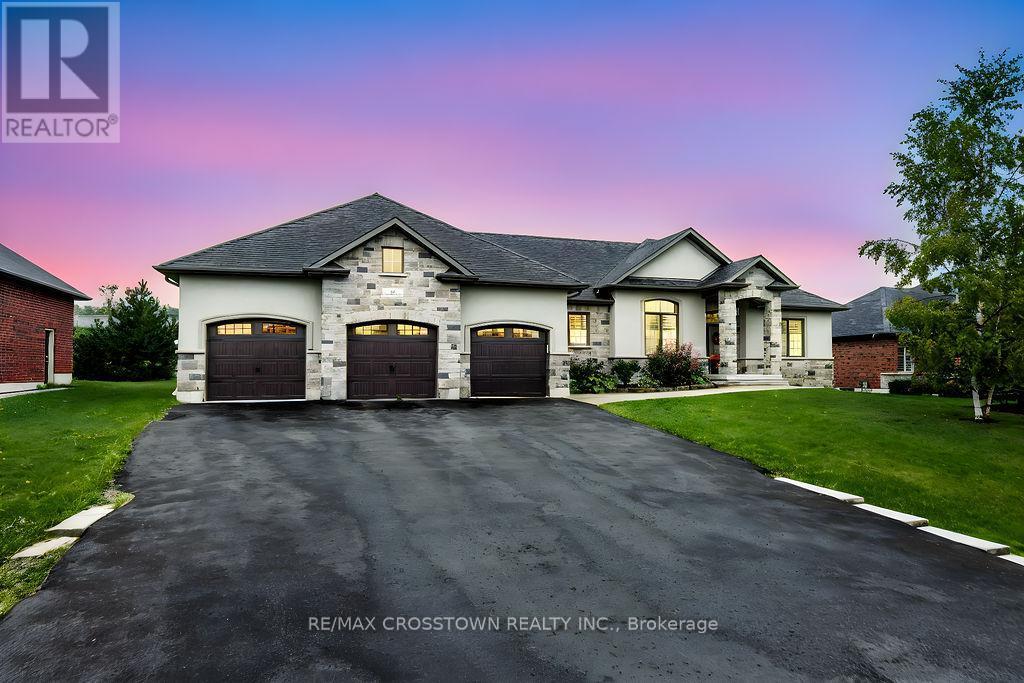 25 Mennill Drive, Springwater, ON - Outdoor With Facade