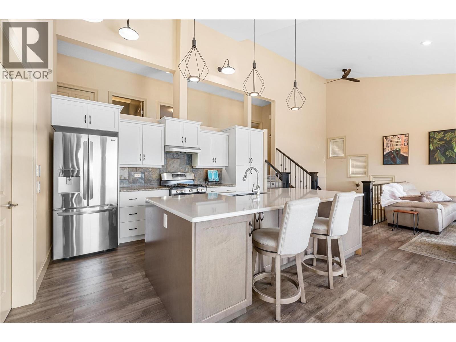 Vaulted ceilings - 1430 Menu Road, West Kelowna, BC - Indoor Photo Showing Kitchen With Stainless Steel Kitchen With Upgraded Kitchen