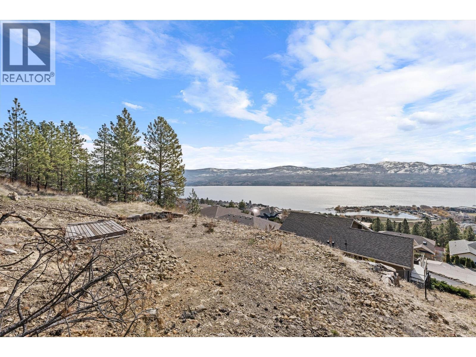 Flattened area above the home, ready for a pool - 1430 Menu Road, West Kelowna, BC - Outdoor With Body Of Water With View