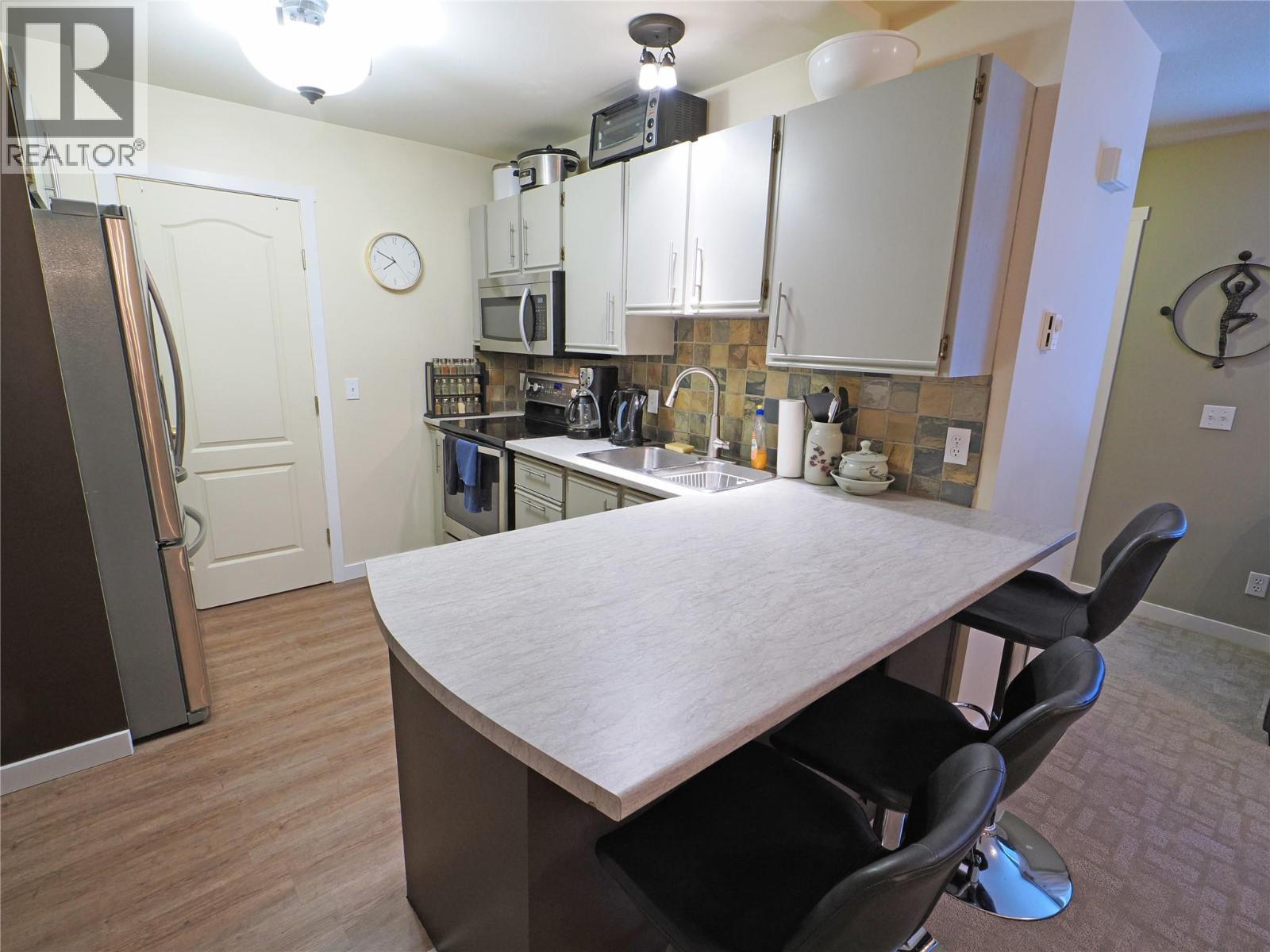 4890D Snowpines Road, Big White, BC - Indoor Photo Showing Kitchen With Double Sink