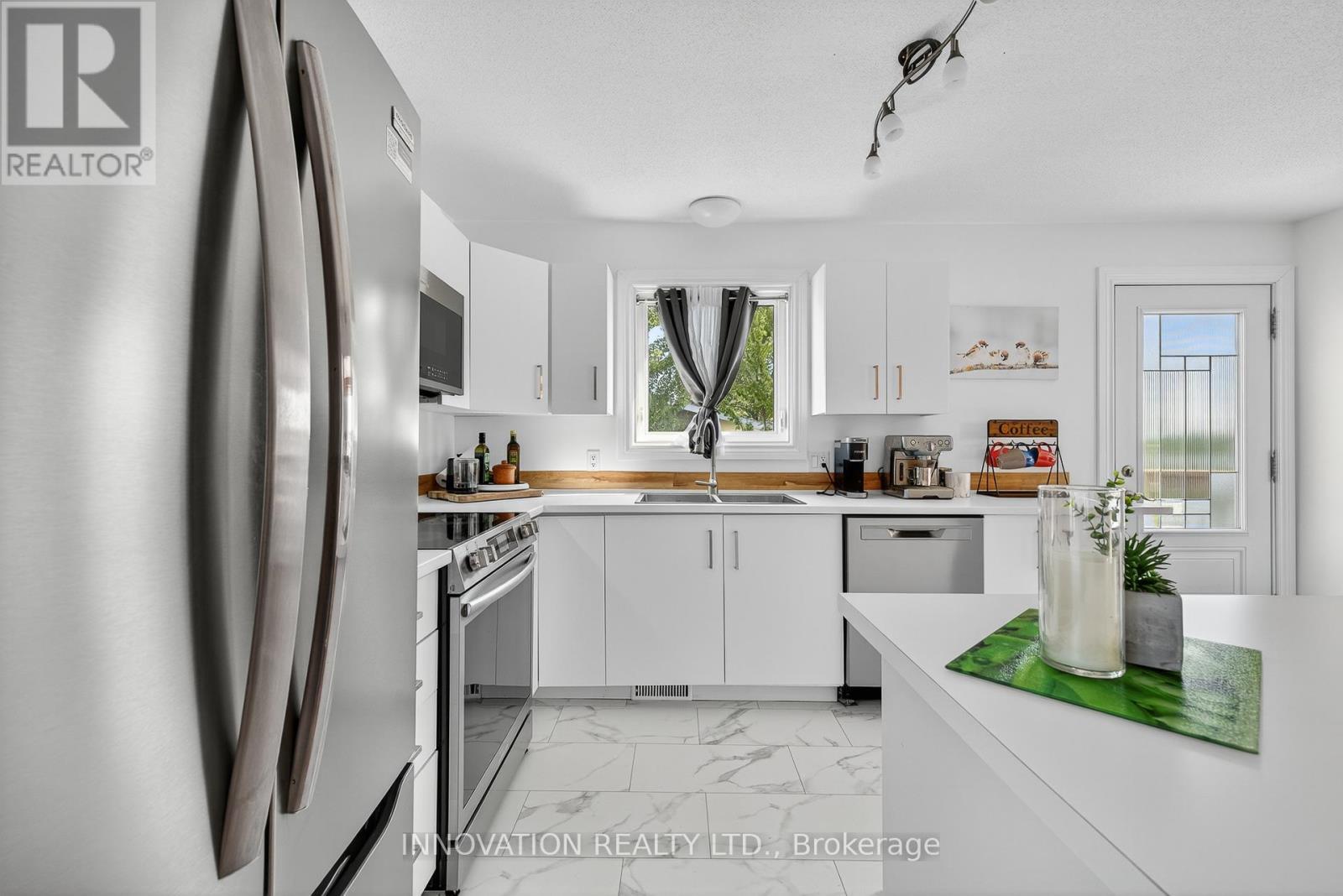 155 Ladouceur Street, Champlain, ON - Indoor Photo Showing Kitchen With Double Sink