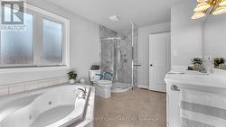 Washroom with Jetted Tub! -