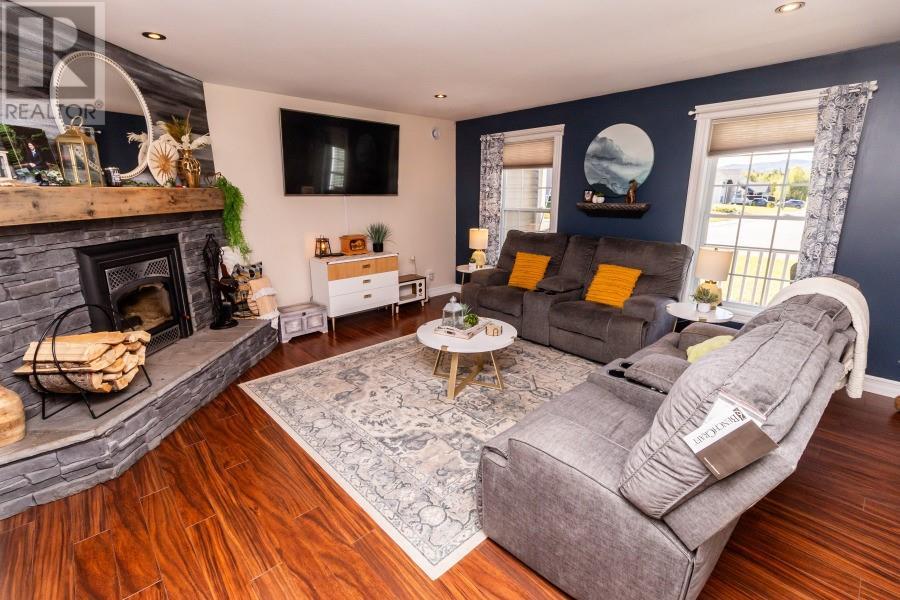 27 Wagg Place, Pasadena, NL - Indoor Photo Showing Living Room With Fireplace