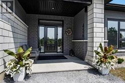 Inviting porch with impressive front entry -