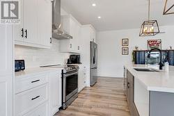 Textured subway backsplash; under counter lighting -