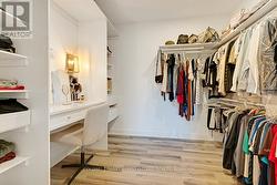 Combined walk-in closet and dressing room -
