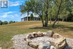 Sitting on knoll, home has bird's eye views -