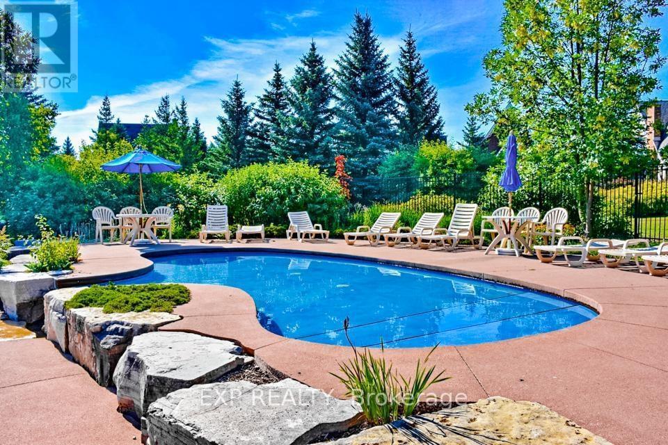 222 - 170 Snowbridge Way, Blue Mountains, ON - Outdoor With In Ground Pool With Backyard