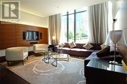 3403 - 28 Ted Rogers Way, Toronto, ON - Indoor Photo Showing Living Room