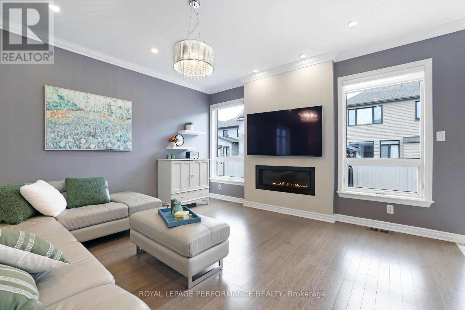 266 Shinleaf Crescent, Ottawa, ON - Indoor Photo Showing Living Room With Fireplace