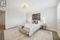 The Primary Bedroom Features a Walk-In Closet -